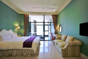 Ένα ή περισσότερα κρεβάτια σε δωμάτιο στο Muen Hot Spring Hotel