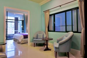 Ένα ή περισσότερα κρεβάτια σε δωμάτιο στο Muen Hot Spring Hotel