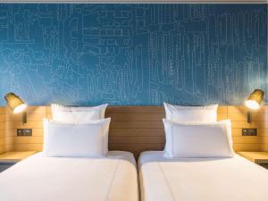 Ein Bett oder Betten in einem Zimmer der Unterkunft Swissotel Nankai Osaka