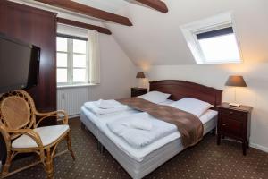 Voodi või voodid majutusasutuse Foldens Hotel toas