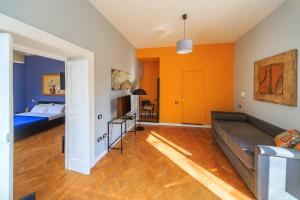 A bed or beds in a room at Spaccanapoli Comfort Suites