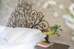 Voodi või voodid majutusasutuse Relais Villa Porta toas