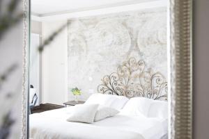 Voodi või voodid majutusasutuse Relais Villa Porta toas