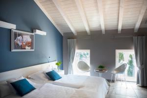 Voodi või voodid majutusasutuse Relais Villa Porta toas