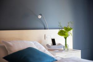 Voodi või voodid majutusasutuse Relais Villa Porta toas