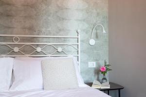 Voodi või voodid majutusasutuse Relais Villa Porta toas