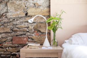 Voodi või voodid majutusasutuse Relais Villa Porta toas