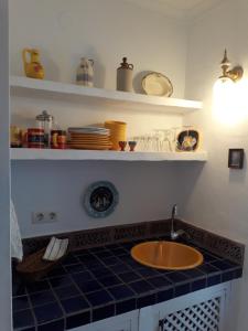 Kuchyňa alebo kuchynka v ubytovaní Guesthouse La Tienda Cómpeta 21b