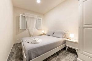 Posteľ alebo postele v izbe v ubytovaní Villa Ferrante + 31 fotografií