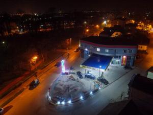 an overhead view of a gas station at night at Motel Gas-Petrol in Brčko
