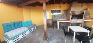 Posezení v ubytování Casita con Barbacoa
