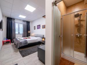 Posteľ alebo postele v izbe v ubytovaní Apartmany Style