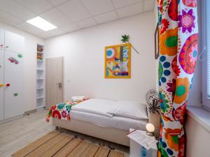 Posteľ alebo postele v izbe v ubytovaní Apartmany Style