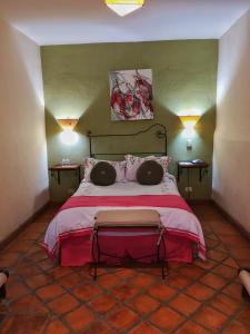Postel nebo postele na pokoji v ubytování Hotel Casa Morena