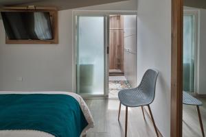 Un pat sau paturi într-o cameră la Asher Hospedaje y Turismo