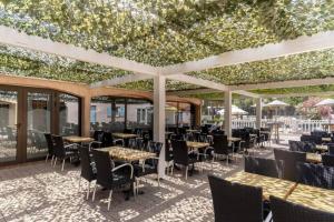 Restaurace v ubytování Châlet dans parc de loisirs 5 étoiles