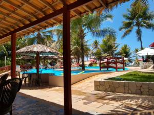 Bazén v ubytování Hotel Coco Beach nebo v jeho okolí
