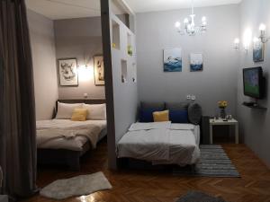 Кровать или кровати в номере Apartment Mia