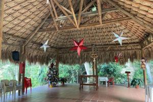 a pavilion with stars and christmas trees in it at Apartasol El Encanto in San Jerónimo