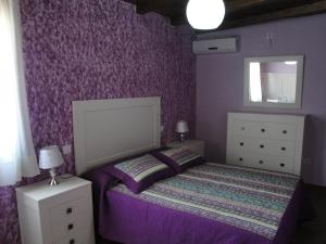 Un pat sau paturi într-o cameră la Casa Rural Sierra San Mamede