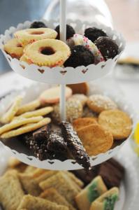 a bunch of different donuts and pastries in buckets at Hjälmargården in Läppe +17 photos