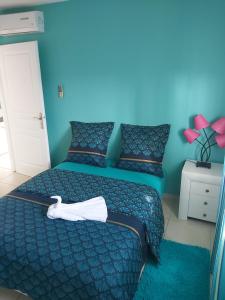 Postel nebo postele na pokoji v ubytování Appartement face à la marina du marin martinique