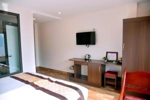 TV a/nebo společenská místnost v ubytování SAPA KING HOTEL HUNG VUONG HOTEl