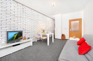Televízia a/alebo spoločenská miestnosť v ubytovaní Apartment Labská 108 Špindlerův MLýn