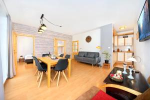 Televízia a/alebo spoločenská miestnosť v ubytovaní Apartment Labská 108 Špindlerův MLýn