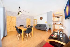 Televízia a/alebo spoločenská miestnosť v ubytovaní Apartment Labská 108 Špindlerův MLýn