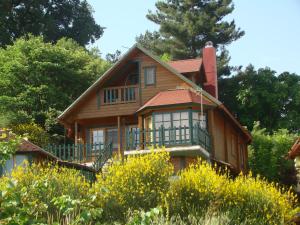 Billede fra billedgalleriet på Zeus-Village οικισμός φινλανδικών chalet με πισίνες & γυμναστήριο i Mólos + 156 billeder