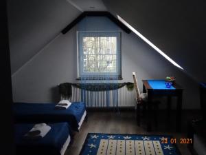 Posteľ alebo postele v izbe v ubytovaní Noclegi nad Morzem u Kasi