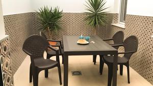 Posezení v ubytování Noria is a comfortable apartment with patio and large terrace in Conil