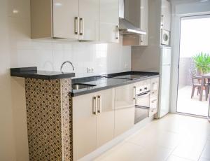 Kuchyň nebo kuchyňský kout v ubytování Noria is a comfortable apartment with patio and large terrace in Conil