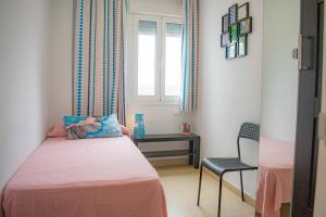 Postel nebo postele na pokoji v ubytování Noria is a comfortable apartment with patio and large terrace in Conil