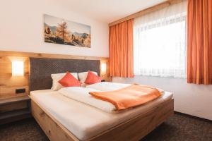 Łóżko lub łóżka w pokoju w obiekcie An der Via Claudia Augusta