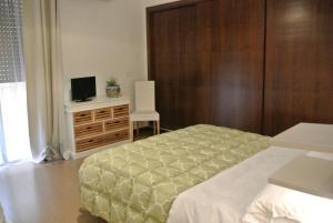 A bed or beds in a room at B&B Via Dei Templi