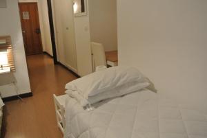 A bed or beds in a room at B&B Via Dei Templi