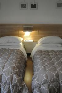 A bed or beds in a room at B&B Via Dei Templi