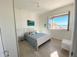 Postel nebo postele na pokoji v ubytování Maison Armandì