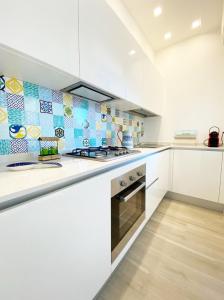 Kuchyň nebo kuchyňský kout v ubytování Maison Armandì