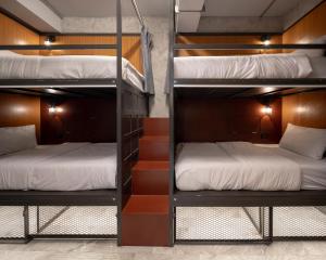 Luk Hostel tesisinde bir odada yatak veya yataklar