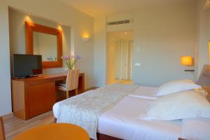 Posteľ alebo postele v izbe v ubytovaní Hotel Valle del Este