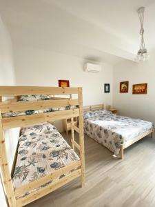 Postel nebo postele na pokoji v ubytování Maison Armandì + 25 fotografií