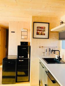 Kuchyň nebo kuchyňský kout v ubytování Ecobeachvilla Buqez 9