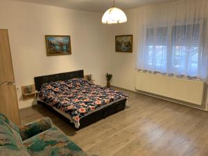 Voodi või voodid majutusasutuse Bástya apartman toas