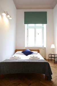 Posteľ alebo postele v izbe v ubytovaní Classic apartments Pilsudskiego street