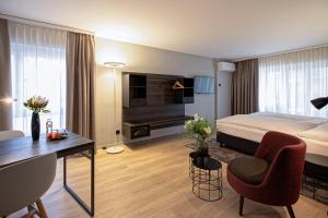 TV in/ali zabaviščno središče v nastanitvi Baxter Hotel