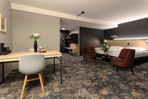 Postelja oz. postelje v sobi nastanitve Baxter Hotel
