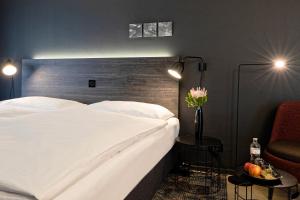 Postelja oz. postelje v sobi nastanitve Baxter Hotel
